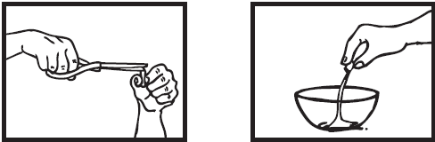 Mano che tiene una fiala di vetro e un ago, l