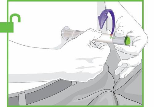 Mano che ruota un dispositivo penna per iniezione con ago inserito, freccia curva indica la rotazione e indicatore verde conferma l