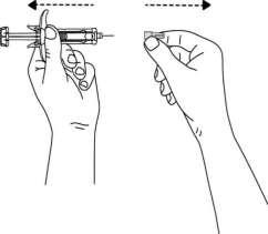 Mano che afferra una siringa con l