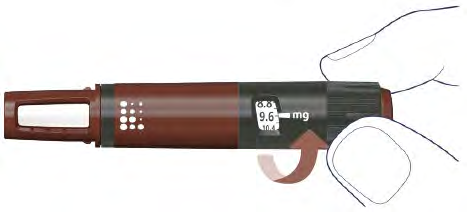 Penna per insulina marrone con indicatore dosaggio 9,6 mg e freccia rossa che indica la regolazione