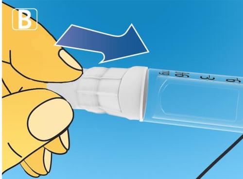 Mano che tiene una siringa graduata trasparente con stantuffo bianco e ago inserito per l