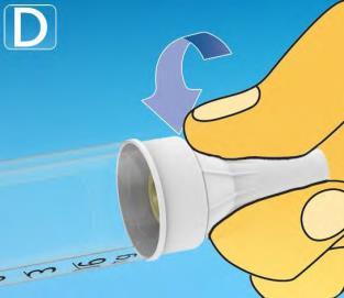 Mano gialla che tiene una siringa trasparente con ago bianco, freccia curva indica la rotazione del dispositivo