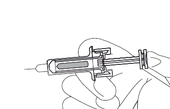 Siringa pre-riempita con ago collegato tenuta in mano, pistone parzialmente premuto e indicatore di dosaggio visibile