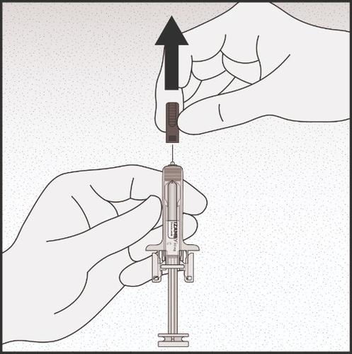 Mano che afferra una siringa preriempita con l