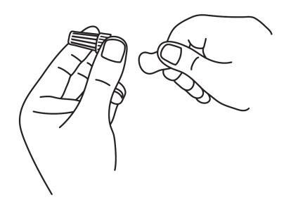 Mani che tengono e manipolano un dispositivo medico cilindrico con scanalature, illustrazione schematica in bianco e nero