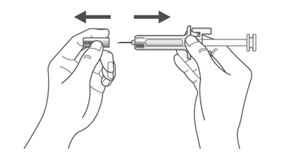 Mani che tengono una siringa prera mpita con l