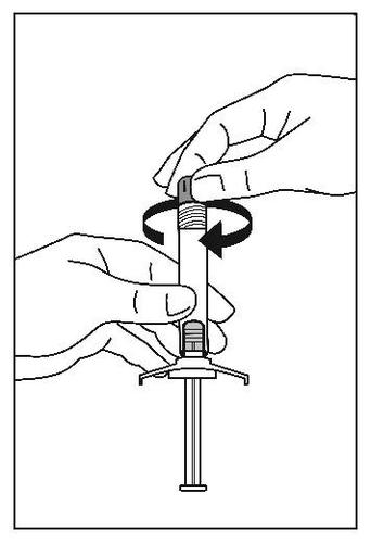 Mani che ruotano un adattatore grigio su una siringa preriempita con ago trasparente freccia curva indica la rotazione