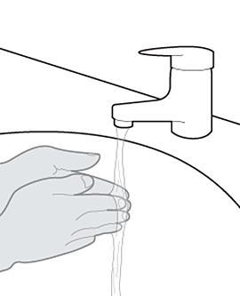 Mano sotto il rubinetto con acqua corrente che scorre verso il palmo aperto lavaggio delle mani igiene