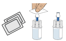 Fiala di medicinale con tappo blu, salviette imbevute e blister di contenitori aperti accanto