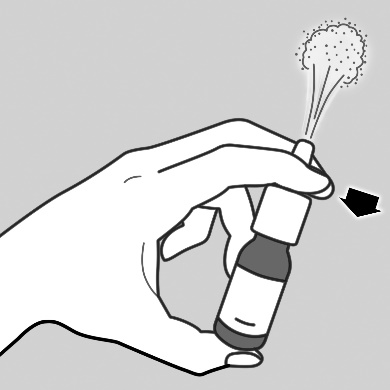 Mano che tiene un flacone spray nasale con una goccia che cade e un