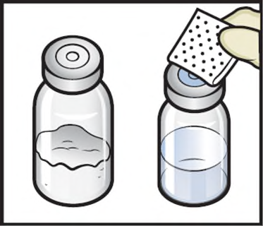 Fiala di vetro con liquido e tappo accanto a un tampone sterile bianco utilizzato per pulire la superficie superiore