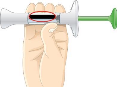 Dispositivo autoiniettante bianco e verde tenuto in mano, con evidenziata l