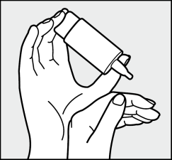 Mano che tiene una penna per iniezione precompilata con l