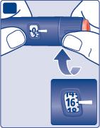 Penna iniettabile blu tenuta da due dita con indicazione freccia verso l