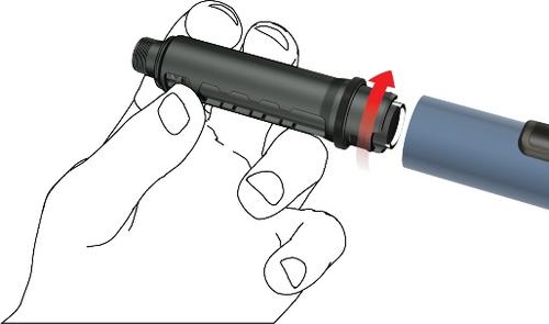 Mano che stringe un dispositivo medico grigio con una freccia rossa che indica il movimento di rotazione di un componente blu