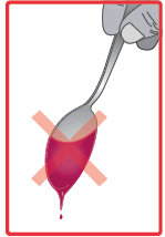 Goccia di liquido rosso che cade da una siringa con due croci rosse sovrapposte a indicare di non utilizzare