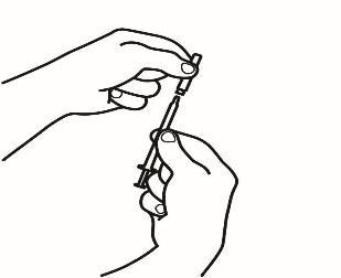 Mani che tengono una siringa preriempita con ago esposto e dispositivo di sicurezza attivo per prevenire punture accidentali