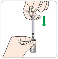 Mano che tiene una siringa pronta per l