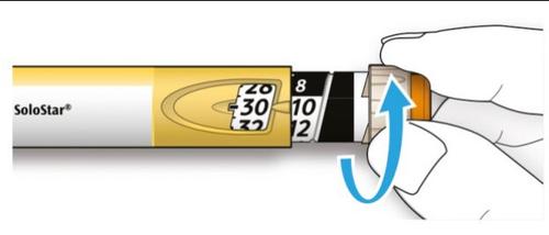 Penna per insulina SoloStar con numeri da 8 a 30 visibili e freccia blu che indica rotazione del selettore di dose tenuta da una mano
