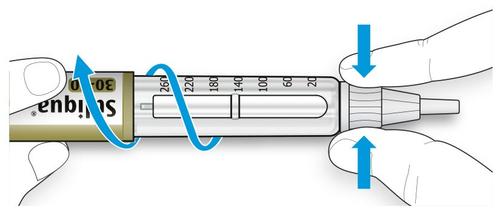 Siringa preriempita con scala graduata da 20 a 30 unit&agrave;, frecce blu indicano la direzione per l