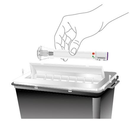 Siringa preriempita bianca e nera sopra un contenitore per oggetti appuntiti e mani che la tengono