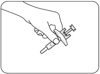 Mano che tiene un dispositivo per iniezione auto-iniettabile con ago esposto pronto per l