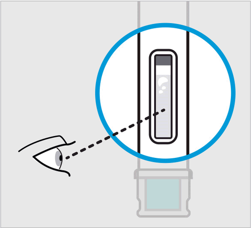Test di gravidanza con linea di controllo e linea di test visibili nella finestra di visualizzazione ingrandita da un cerchio blu