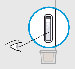 Test di gravidanza con linea di controllo e linea di risultato visibili nella finestra di lettura