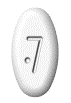 Compressa ovale bianca con il numero 7 inciso e un piccolo punto al lato inferiore