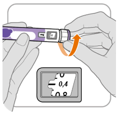Penna iniettabile con ago inserito e freccia arancione che indica la direzione di rotazione del dispositivo su un cerotto trasparente