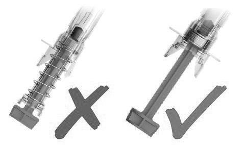 Due aghi per iniezione sovrapposti con meccanismi a molla visibili e punte smussate incrociate