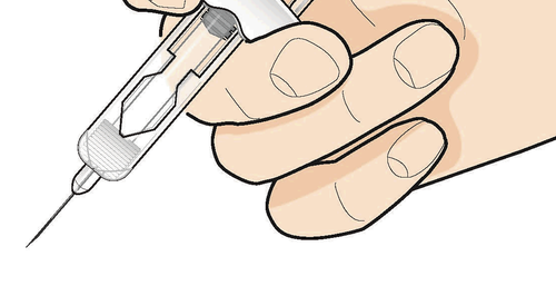 Mano che tiene una siringa trasparente con ago sottile, pronta per l