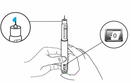 Penna per insulina tenuta in mano con dettagli ingranditi sull