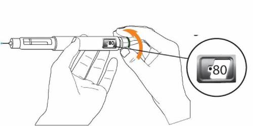 Penna per iniezione con display che indica 80 unit&agrave;, tenuta in mano con freccia che mostra la rotazione del selettore