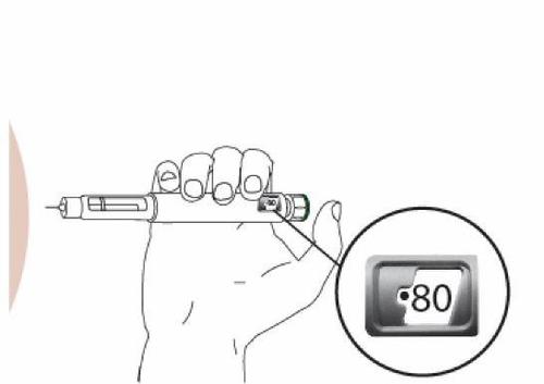 Mano che tiene un dispositivo per iniezione con display digitale che mostra il numero 80 e un cerchio di ingrandimento