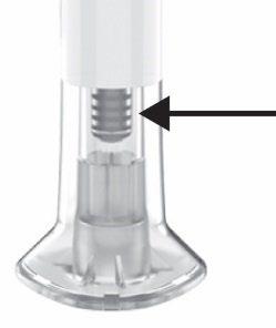 Connettore trasparente a forma cilindrica con filettatura interna e base allargata con incavi laterali freccia nera indica la parte superiore