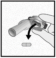 Dispositivo autoiniettante con ago esposto e freccia che indica l