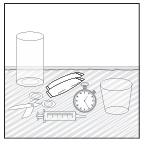 Fiala, siringa con ago, timer, cilindro graduato e altri strumenti medici disposti su una superficie a righe