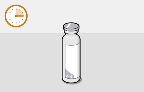 Fiala di vetro trasparente con tappo grigio e indicazione 2 ml su sfondo grigio chiaro con orologio a parete arancione