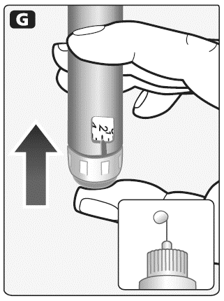 Penna iniettabile grigia tenuta da una mano con indicazione di pressione verso l