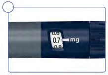 Penna iniettabile blu con display digitale che mostra 00 mg e una freccia che indica 07 mg