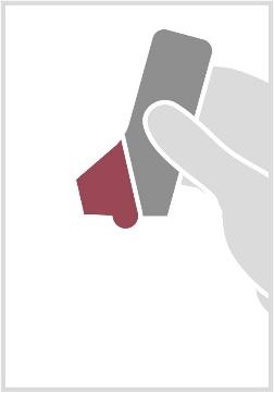 Mano che afferra una cartuccia farmaceutica con stantuffo rosso e corpo grigio chiaro