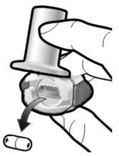 Dispositivo medico con capsula inserita, freccia che indica la direzione di rotazione e mano che lo tiene