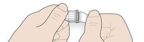 Mani che assemblano un dispositivo medico composto da un cilindro trasparente e un adattatore bianco a forma di cono