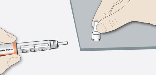 Penna iniettabile con ago fissato e adattatore di sicurezza grigio collegato all