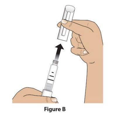 Mano che tiene il dispositivo iniettore con l