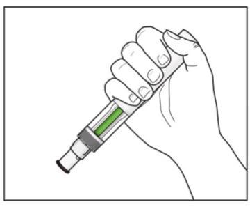 Mano che tiene un dispositivo penna per iniezione con indicatore verde visibile e ago protetto