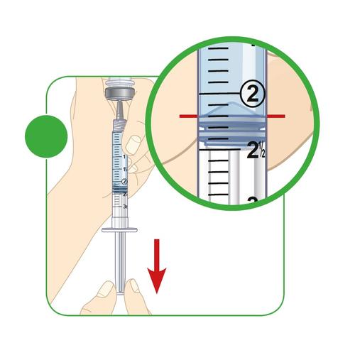 Siringa trasparente con stantuffo numerato e ago rivolto verso il basso indicando l