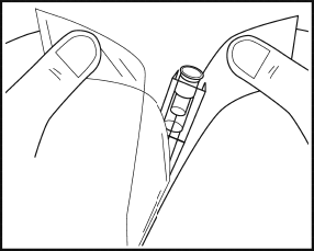 Due dita che tengono e preparano una cartuccia medicinale con un ago di metallo inserito parzialmente