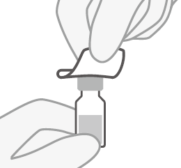 Mano che tiene una fiala di vetro con un liquido chiaro e un tappo di gomma superiore